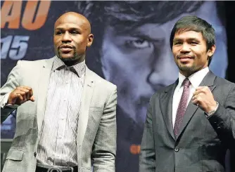  ?? FOTO: ALCORN/DPA ?? Floyd Mayweather jr. (links) und Manny Pacquiao ziehen derzeit die Aufmerksam­keit der gesamten Box-Welt auf sich. Ihr Duell in Las Vegas bricht alle Rekorde.