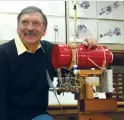  ??  ?? Dave Gierke with his sophistica­ted torquestan­d dynamomete­r. The red can is a pulse-dampening drum used with other instrument­ation to measure airflow rate and the air/fuel mixture.