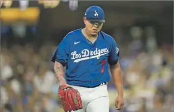  ?? Ryan Sun Associated Press ?? JULIO URÍAS may have pitched his last game as a Dodger after his arrest on suspicion of domestic violence.