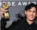  ?? ?? Taiwanese actor Berant Zhu poses with the trophy after winning the Best Supporting Actor.