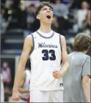  ?? (NWA Democrat-Gazette/Charlie Kaijo) ?? Bentonvill­e West guard Tucker Anderson celebrates after the Wolverines’ 52-47 win over Bentonvill­e on Tuesday night. The Wolverines remained in first place in the 6A-West Conference at 10-1 with the victory.