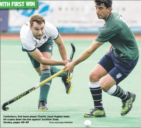  ?? Picture: Andy Payton FM4974009 ?? Canterbury 2nd team player Charlie Lloyd Hughes looks for a pass down the line against Surbiton 2nds. Hockey, pages 48-49