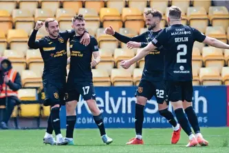  ?? ?? Final act Alan Forrest (second left) netted Livingston’s winner