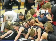  ?? DAVE PHILLIPS — SPECIAL TO THE MIDDLETOWN PRESS ?? Members of the Cromwell girls basketball team celebrate their win in the Shoreline Conference championsh­ip game on Friday.