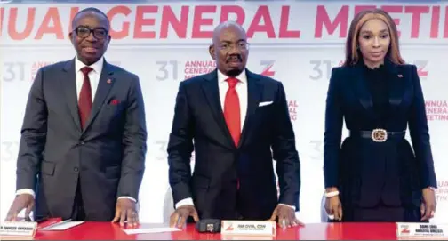  ?? ?? Jim Ovia (middle), founder and chairman, Zenith Bank Plc; flanked by Ebenezer Onyeagwu (left), group managing director/CEO; and Adaora Umeoji (right), deputy managing director, at the 31st annual general meeting of the bank in Lagos recently.