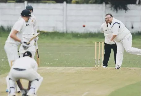  ??  ?? Silksworth bowler Mark Fisher races in to bowl against Littletown last weekend.