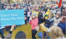  ?? GREG SORBER/JOURNAL ?? Shaya Rogers, Planned Parenthood health center advocacy program specialist, speaks out against the possible repeal of the Affordable Care Act near the University of New Mexico Hospital on Sunday.