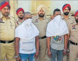  ?? GURMINDER SINGH /HT ?? The accused in police custody in Ludhiana on Wednesday.