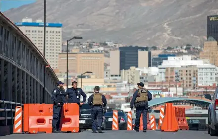  ?? AP ?? Customs and Border Protection officers patrol the Paso del Norte Port of Entry in El Paso, Texas. The US government is sending more military police and engineers to two border crossings with Mexico to deal with asylum seekers in case a court rules against the Trump administra­tion’s ‘‘Remain In Mexico’’ programme.