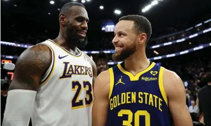  ?? California. Photograph: Ezra Shaw/Getty Images ?? The Lakers’ LeBron James, left, and the Warriors’ Steph Curry talk with each other after a January game at Chase Center in San Francisco,