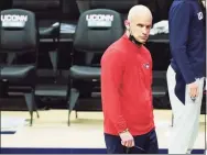  ?? David Butler II / Associated Press ?? UConn coach Dan Hurley watches from the sideline during the second against Butler in January.