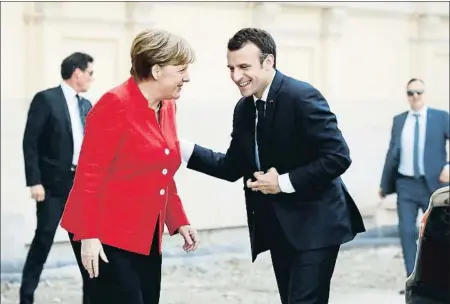  ?? ODD ANDERSEN / AFP ?? Merkel es contraria a los eurobonos y Macron quiere un plan más ambicioso