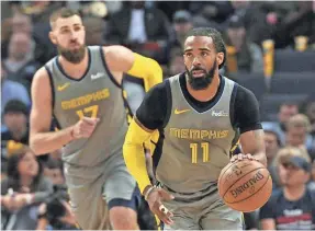  ?? JUSTIN FORD/USA TODAY SPORTS ?? Point guard Mike Conley (11), who averaged a career-high 21.1 points per game last season, is being traded to the Jazz.