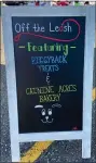  ?? SUBMITTED PHOTO ?? A chalkboard on display for Off The Leash Dog Truck — a mobile, retail dog treat truck selling locally-made and healthy treats.