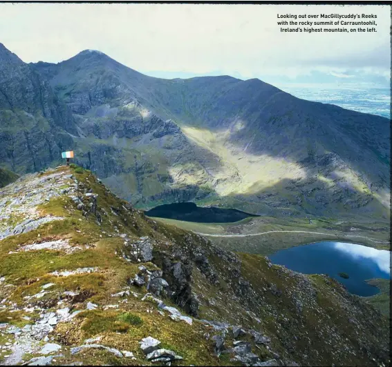  ??  ?? Looking out over MacGillycu­ddy’s Reeks with the rocky summit of Carrauntoo­hil, Ireland’s highest mountain, on the left.