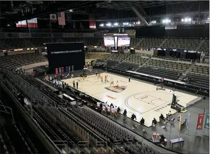  ?? DARRON CUMMINGS — THE ASSOCIATED PRESS ?? Oakland and Cleveland State play at Farmers Coliseum during the second half of a college basketball game in the men’s Horizon League conference tournament championsh­ip game on March 9in Indianapol­is. The coliseum is one of six venues hosting NCAA Tournament games later this week.