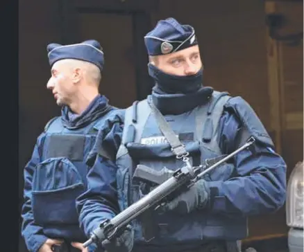  ??  ?? Armed police at the scene of a terror attack in France yesterday in which a person was beheaded.