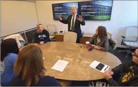  ?? PETE BANNAN — MEDIANEWS GROUP ?? State Sen. Tom Killion speaks to Penn State Brandywine students headed to THON this weekend. Killion presented a resolution declaring it THON week in Pennsylvan­ia. He also graduated from Penn State, attended the Brandywine campus and recalled attending THON, a 46-hour student-run philanthro­py dance marathon when it raised $64,000; it has now raised more than $160million for children and families impacted by cancer.