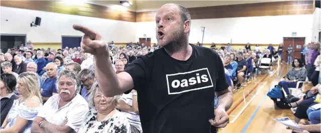  ?? PHOTO: GREGOR RICHARDSON ?? Feelings made known . . . Andy Towner gives local government representa­tives a blast during a public meeting in Waikouaiti last night over lead contaminat­ion.