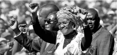 ?? — Reuters photo ?? File photo shows Mugabe and his wife Grace greeting supporters of his Zanu (PF) party during a rally in Harare.