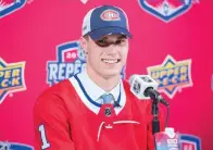  ?? Ryan Remiorz/The Canadian Press via AP ?? ■ Juraj Slafkovsky smiles Thursday during a news conference after being selected as the first overall pick by the Montreal Canadiens during the NHL hockey draft in Montreal.