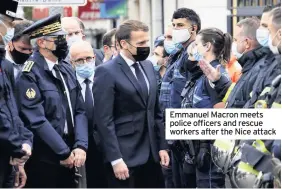  ??  ?? Emmanuel Macron meets police officers and rescue workers after the Nice attack