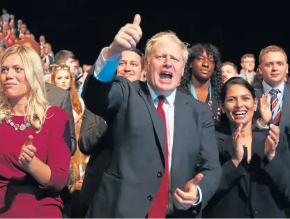  ?? Picture: AP. ?? Boris Johnson: All smiles at the conference following Chancellor Sajid Javid’s speech.