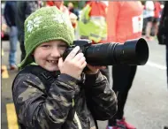  ??  ?? Caught on camera .... 8 year old Darragh Grayson from Glenbeigh getting the action on the start line at the 30th Curlews O’Shea Cup Run in Beaufort on New Year’s Day.