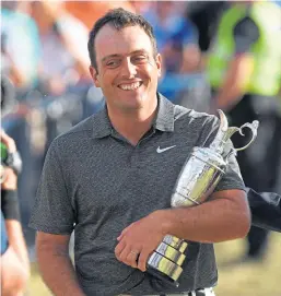  ?? Picture: SNS. ?? Italian Francesco Molinari holds on to the Claret Jug after winning the Open Championsh­ip in 2018.