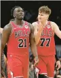  ?? JESS RAPFOGEL/GETTY ?? Bulls Henri Drell talks to Adama Sanogo, left, as he walks to take foul shots against the Wizards on Friday.