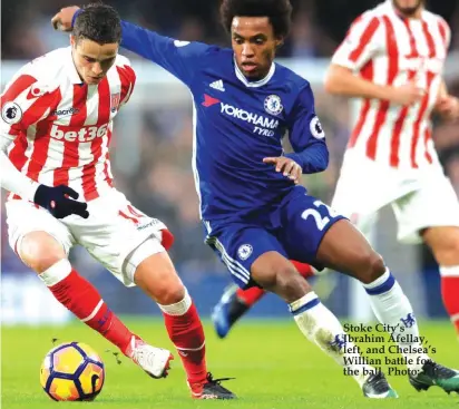  ??  ?? Stoke City’s Ibrahim Afellay, left, and Chelsea’s Willian battle for the ball Photo: AP