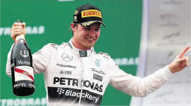  ??  ?? CELEBRATIO­N TIME: For Germany’s Nico Rosberg after securing his second successive Formula One win at Brazil’s Interlagos track
