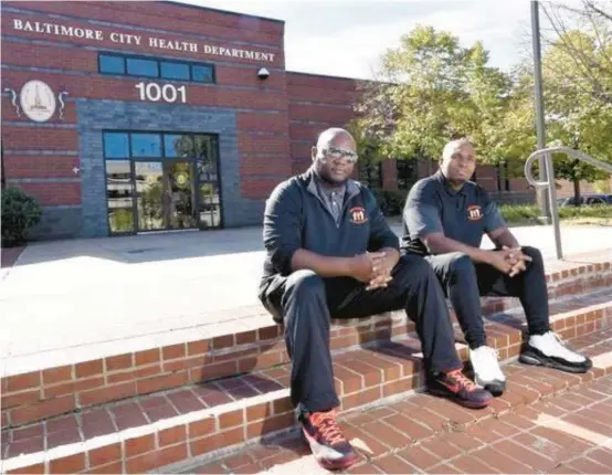  ?? JAMES TIMPSON/COURTESY ?? James “JT” Timpson and Dante “Tater” Barksdale in 2017, outside the offices of the Baltimore City Health Department and the Safe Streets program.