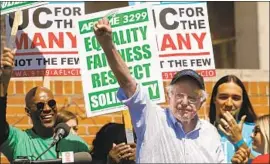  ?? Genaro Molina Los Angeles Times ?? DEMOCRATIC presidenti­al candidate Sen. Bernie Sanders expresses solidarity with striking University of California workers as he begins a visit to the state.