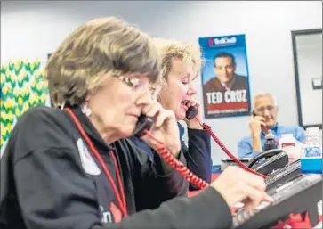  ?? Brendan Hoffman Getty Images ?? MARSHA SCHOOLCRAF­T, from left, Mary Elizabeth Jackson and David Carter, all from Texas, make calls for Ted Cruz at his Iowa campaign headquarte­rs in Urbandale. Volunteers paid their own way to Iowa.