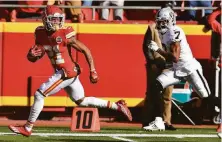  ?? Rich Sugg / Kansas City Star / TNS ?? K.C. cornerback Mike Hughes sprints toward the end zone after recovering a first-quarter fumble against the Raiders.