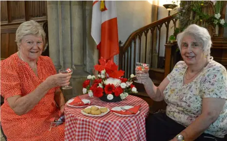  ??  ?? CANADIAN AFFAIR: Joanna Brown (Assistant Church Warden) and Muriel Sheehan (retired Church Warden) with their Canadian arrangemen­t