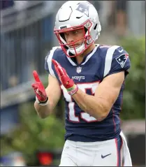  ?? Photo by Louriann Mardo-Zayat / lmzartwork­s.com ?? On Friday, Patriots wide receiver Chris Hogan was seen wearing a Red Sox hat. On Sunday night, the recently crowned World Series champions will be recognized before New England takes the field against the Green Bay Packers.