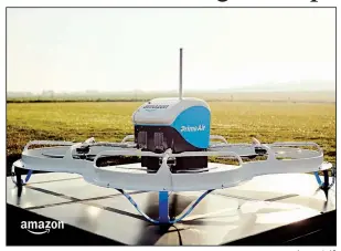  ?? Amazon via AP ?? An Amazon Prime Air drone, developed for delivering packages, is shown in Cambridges­hire, United Kingdom, in December 2016. Amazon founder Jeff Bezos’ 2013 prediction that drones would be dropping off customers’ purchases in “four, five years” has proven wrong.
