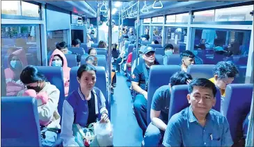  ?? CITYBUS ?? Passengers enjoy travelling on a Citybus during the Khmer New Year holiday period.