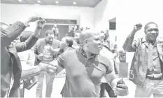  ?? AGENCE FRANCE PRESSE ?? Supporters of the president elect Emmerson Mnangagwa celebrate after the announceme­nt of his re-election in Harare8.