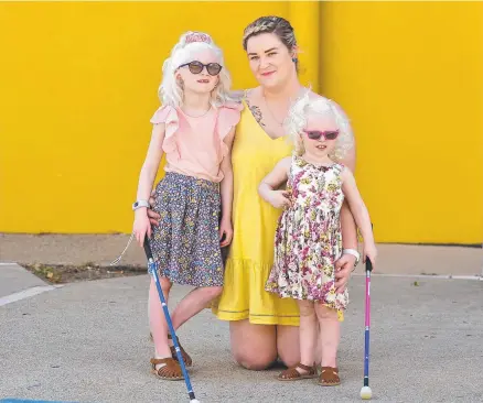  ?? Picture: MATT TAYLOR ?? PERMIT DENIED: Hailey Brown with her daughters Arliyah and Mackenzie Brown, who are both legally blind.