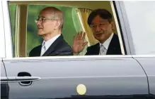  ?? — AP ?? Long live the emperor!: Naruhito waving as he leaves the Imperial Palace after the enthroneme­nt ceremony.
