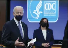  ?? PATRICK SEMANSKY
AP PHOTO/ ?? President Joe Biden speaks as Vice President Kamala Harris listens during a COVID-19 briefing at the headquarte­rs for the Centers for Disease Control and Prevention, Friday in Atlanta.