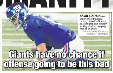  ?? N.Y. Post: Charles Wenzelberg; Robert Sabo; Getty Images ?? DOWN & OUT: Daniel Jones spent the night picking himself off the mat, as Brian Daboll is already looking at a lost campaign with no answers.