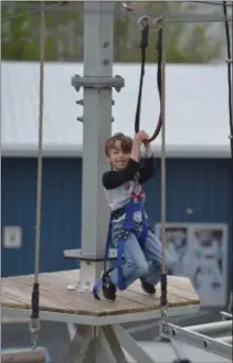  ?? PETE BANNAN-MEDIANEWS GROUP ?? Declan Posner enjoys the venture course at Chester County Sports Arena.