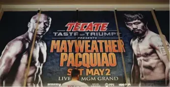  ?? JOHN LOCHER/THE ASSOCIATED PRESS ?? Vegas is all abuzz about the Mayweather-Pacquiao fight that takes place Saturday night at the MGM Grand.