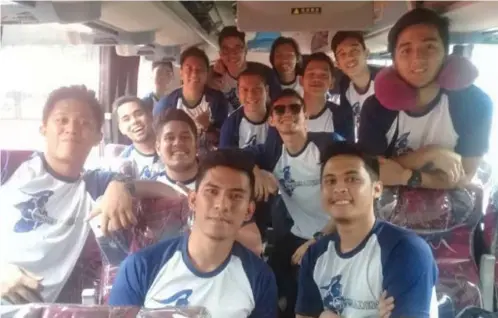  ??  ?? The Xavier University Crusaders of coach Rocky Calingin take a bus to Davao City on Tuesday for today's Philippine Collegiate Champions League. (Jaime A. Frias II)