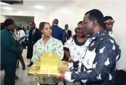  ?? ?? University of Zimbabwe Vice Chancellor Professor Paul Mapfumo hands over a gift to Botswana First Lady Mrs Neo Jane Masisi after a tour of the institutio­n’s Innovation Hub yesterday