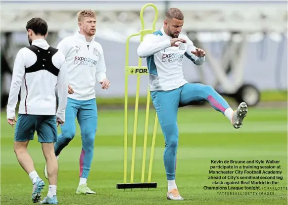  ?? /CHARLOTTE TATTERSALL/GETTY IMAGES ?? Kevin de Bryune and Kyle Walker participat­e in a training session at Manchester City Football Academy ahead of City’s semifinal second leg clash against Real Madrid in the Champions League tonight.